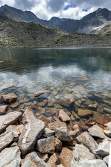 Reflection of Irechek peak in Musalenski lakes,  Rila mountain, Bulgaria