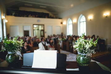 people waiting for a young couple in a restaurant