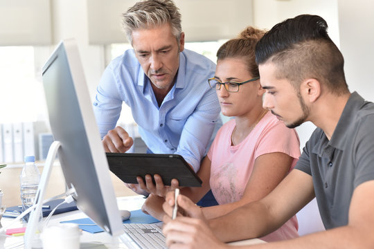 Students in design training course using tablet