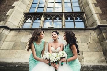 young bride and her bridesmaids waiting for their men