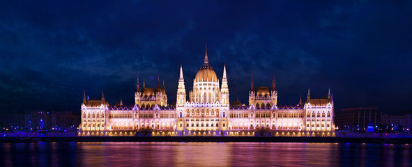 The Hungarian Parliament Building at Danube in Budapest at eveni