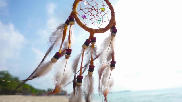 Dream Catcher Swinging at the Wind on the Beach. Slow Motion