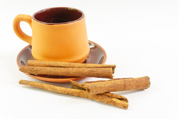 empty cup coffee and cinamon stick on white background