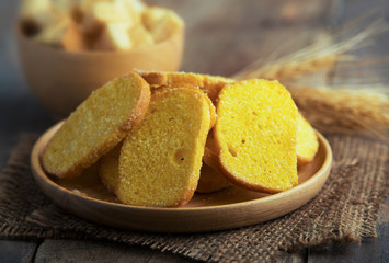 Crispy Toast Bread on wooden background