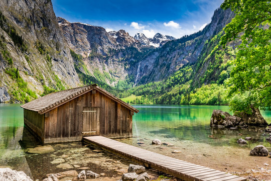 Small wooden cabin at the Obersee lake in German Alps