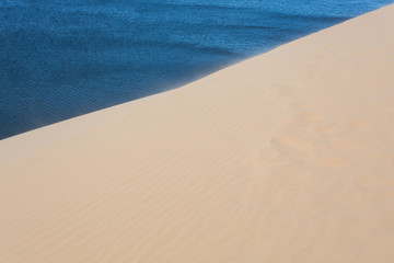 Fototapeta na wymiar white sand dune desert in Mui Ne, Vietnam