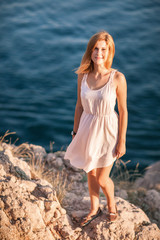 lifestyle concept - beautiful happy woman enjoying summer outdoors