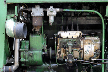 Close-up of an old tractor engine.