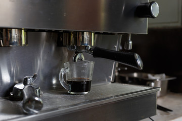 coffee making process from coffee machine in cafe shop