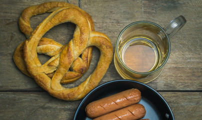 Beer mug, pretzels, and sausages
