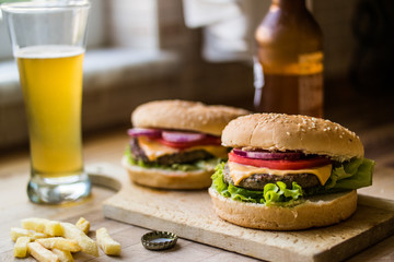 Homemade Hamburgers with Potatoes and Beverage.