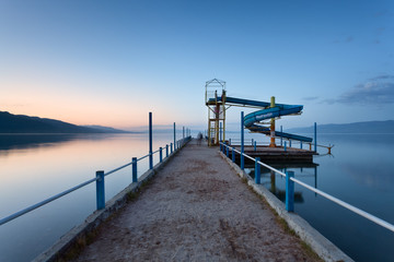Water slide by the Lake Ohrid at twilight, Pogradec, Albania