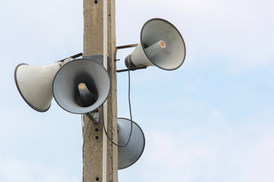 Loudspeaker against the sky clouds out side