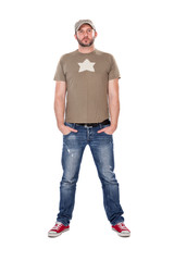 man with hat, t-shirt and jeans standing, isolated on white background