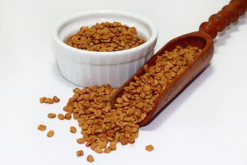 fenugreek seeds isolated on white background