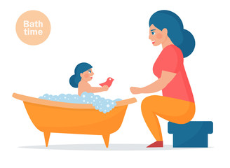 Mother washes the baby