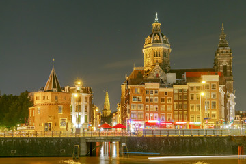 Fototapeta premium Amsterdam. St. Nicholas Church at night.