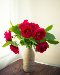 Red roses in a vase