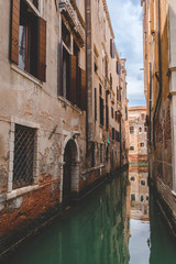 Fototapeta na wymiar Canal and houses in Venice