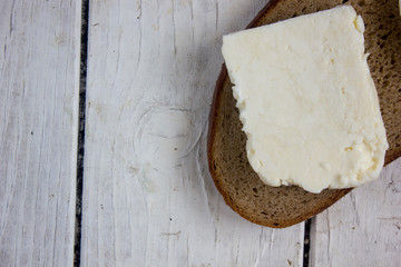 Traditional indian cheese panneer on piece of bread