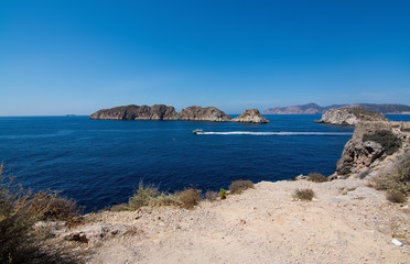 Fototapeta na wymiar Rocky landscape, Mediterranean ocean and islets of Malgrats