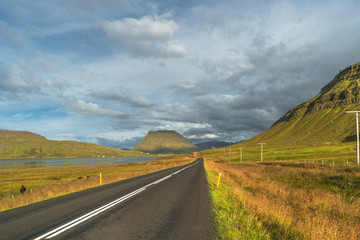 Isolated road and Icelandic colorful landscape at Iceland, summe