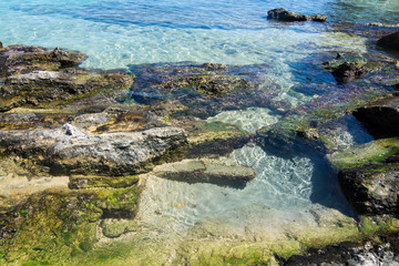 Shallow water on sandy beach