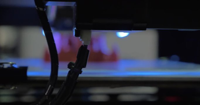 In Moscow, Russia on exhibition Robotix expo on a 3D printer prints a toy castle