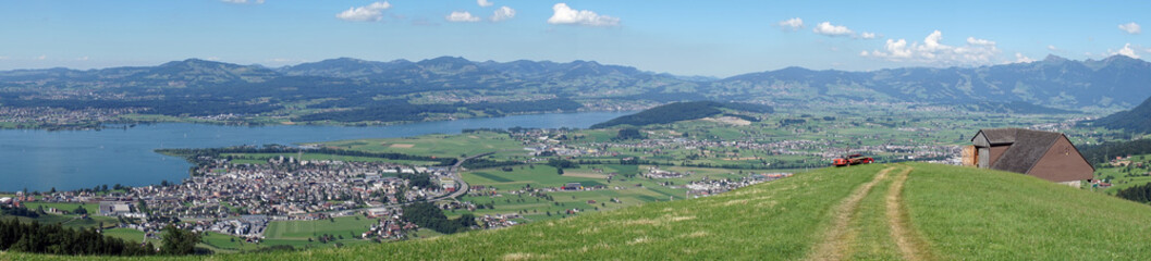 Fototapeta premium Farm field and lake