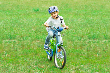 Boy Riding Bicycle