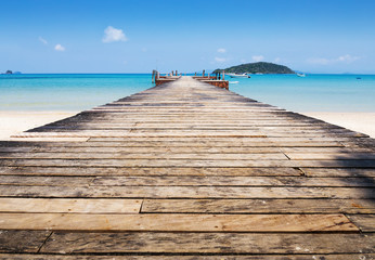 Wooden jetty on exotic beach Koh Chang island, Thailand
