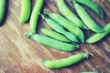 peas, wood background


