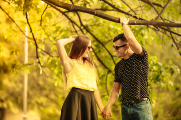 Affectionate couple in park.