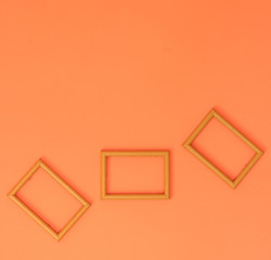 wooden frame on orange vintage wall