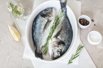 Fresh dorado fish with herbs and pepper