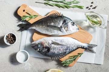 Fresh dorado fish with herbs and pepper