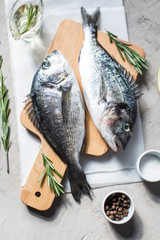 Fresh dorado fish with herbs and pepper
