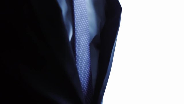 male groom wears a necktie accessory jacket