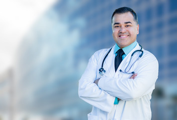 Hispanic Male Doctor or Nurse In Front Of Hospital