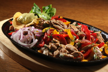 beef fajita in pan