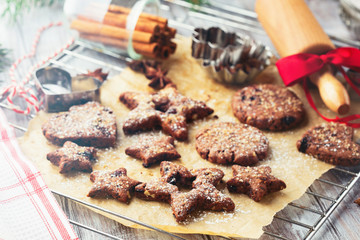 Christmas butter chocolate cookies with festive decoration on white wooden background. Selective focus, Effect toning Instagram