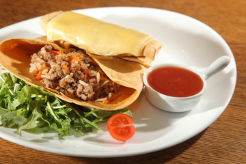 corn tortilla with meat and rice