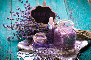 Aromatherapy oil and lavender, spa,  on a wooden background