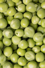 green peas on wooden table ,healthy concept