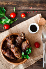 beef stuffed with mushrooms in a bowl on a wooden table
