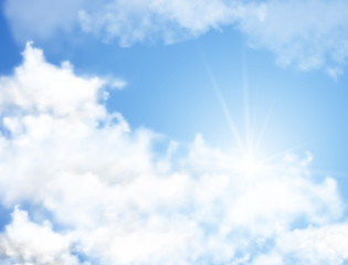 Realistic blue sky with white clouds and sun rays