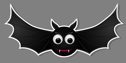 Flying bat isolated on grey background.