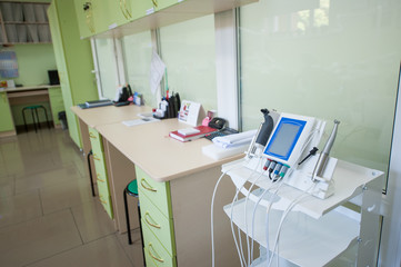 Dentist equipment in dental ofiice on the background of workplace by doctors dentists