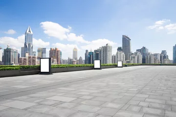 Fototapeten cityscape and skyline of shanghai from empty brick floor © zhu difeng