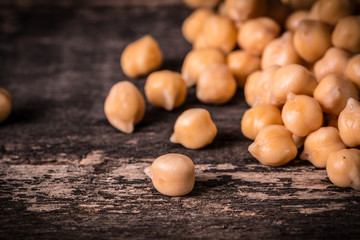 chickpeas on rustic background, healthy food concept
